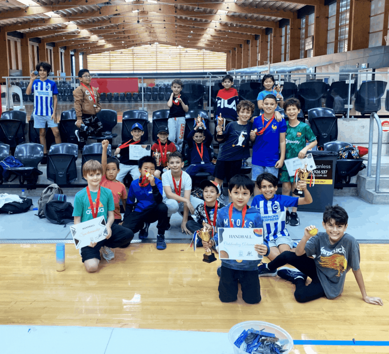 Kids having fun on the handball school program